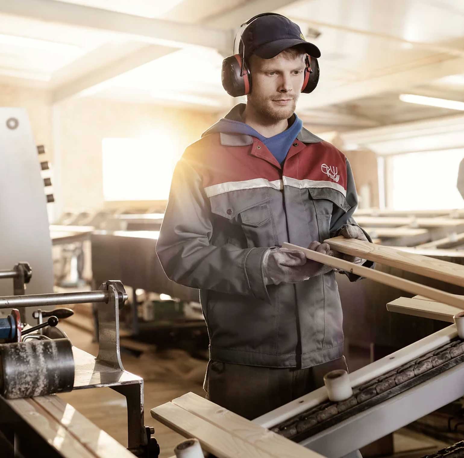 Man operating a wood machinery