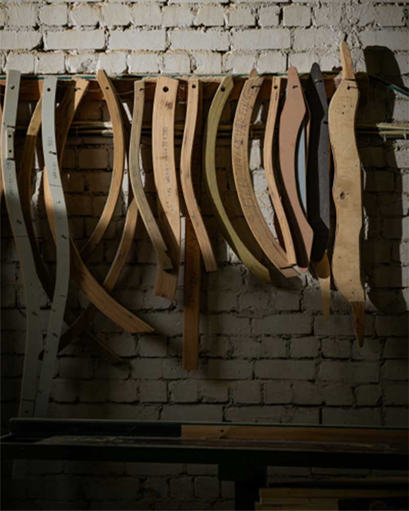 Wall of hanging wood pieces