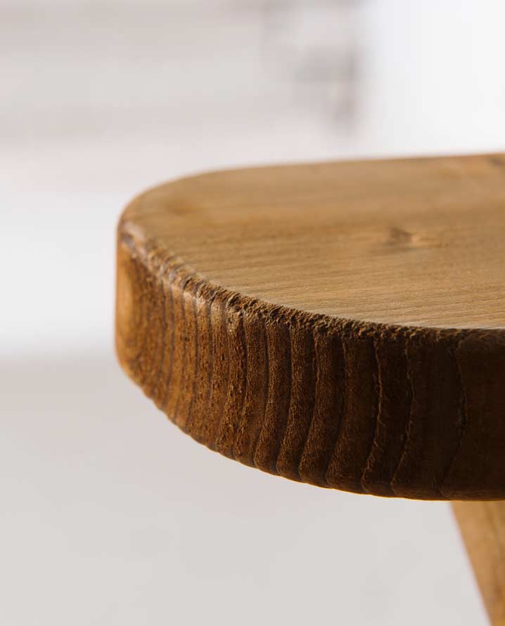 Closeup of rough edges on wooden outdoor furniture