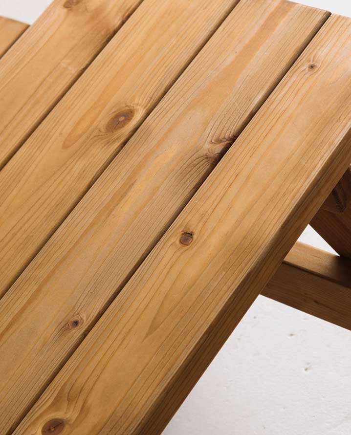 Closeup of uneven texture on a wooden chair